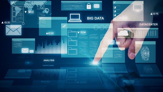 A hand interacts with a digital interface displaying various icons, emphasizing the importance of web development.